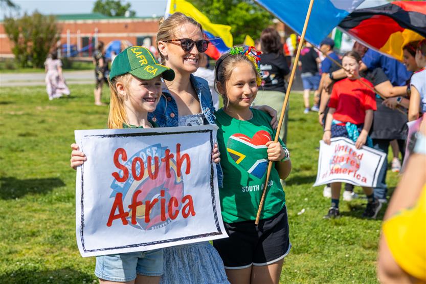 Students participate in flag parade